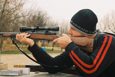 Greg at target practice for deer hunting.