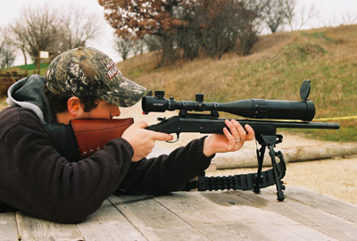 Sam at target practice for squirrel hunting.