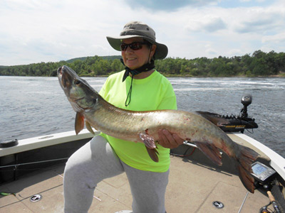 Chris with her first musky