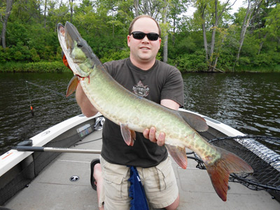 Brent with his first musky