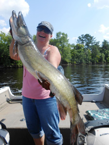 Erin Couillard with her first musky