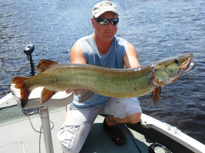 Hooksetters Guide Phil Schweik with a nice musky