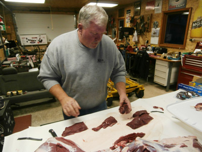 Glenn Moberg processing some fresh venison
