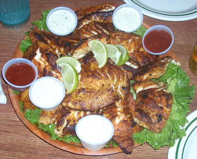 The prize of the day. A dinner of freshly caught fish from the ocean.