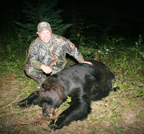 Craig Cichanofsky with bear