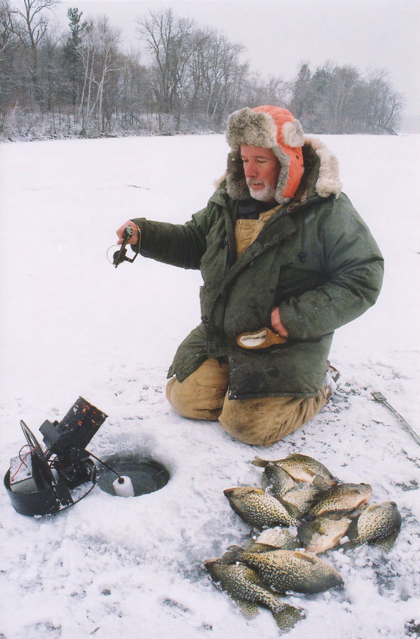 man ice fishing