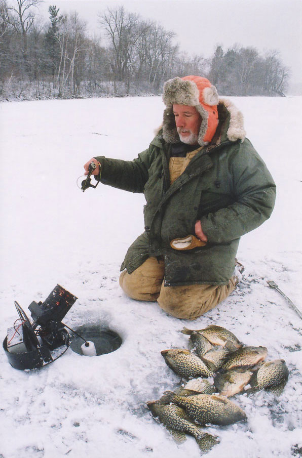 man ice fishing