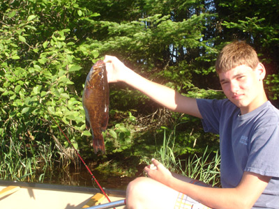 Adam Schacht of Grafton pulls in a nice smallmouth bass