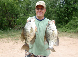 Terry Woldvogel with a couple of nice crappies.