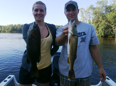 Dustin Linzmeier and his girlfriend Amber with a nice bass and walleye double on the Wisconsin River