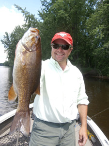 Scott Severtson from Alberta Canada with a nice smallmouth bass