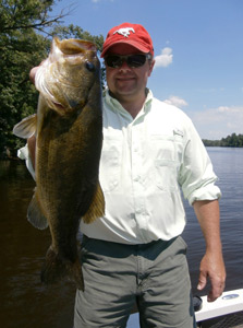 Scott Severtson form Alberta Canada with a nice largemouth bass