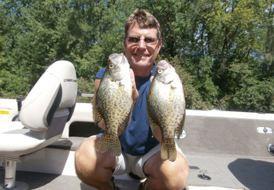 Terry Woldvogel with a couple of nice crappies.