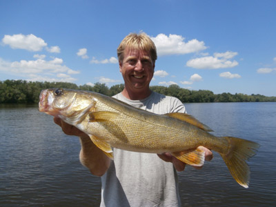 Hooksetters guide Phil Schweik with a good Wisconsin River walleye taken during the Dan Sandstrom Walleye Tournament