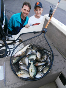 Arnold and Will Johnson with their catch of panfish