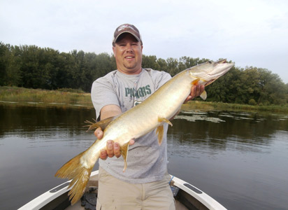 Andy Jackson with a musky he caught on his 3rd cast!