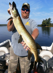 Mark Mccumber with one of his muskies from the world musky Hunt
