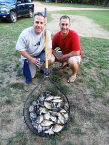 Adam and Mark with a nice pile of bluegills
