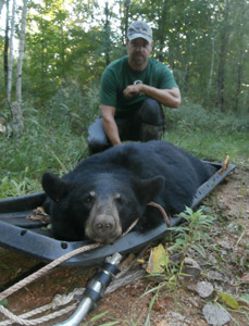 Dan Hoerter with his first black bear which he took off of one of my bear baiting stations in Marathon County.