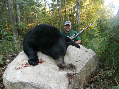 Dan Hoerter with his first black bear which he took off of one of my bear baiting stations in Marathon County