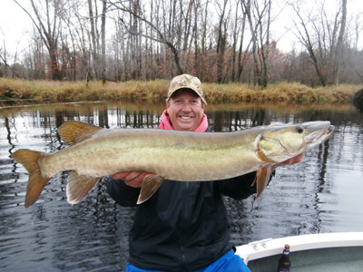 Hooksetters guide Phil Schweik with a good fall jigging musky