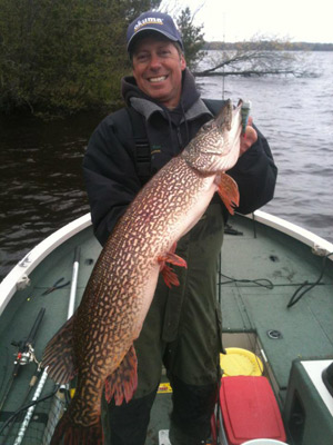 Hooksetters Guide John Sparbel with a 42 inch 20 pound northern pike