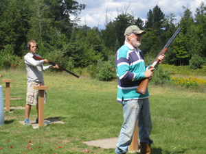 Grandpa Henske and Mitch Groth wait for another clay pigeon.